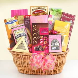 $89.99 SPECIAL SAVINGS!!! FREE SHIPPING Surprise Mom with the basket overflowing with gourmet munchies.  Godiva milk chocolate truffles, Lindt truffles, butter cookies, gourmet peppermint popcorn, truffle cookies, biscotti, English tea cookies, Ghirardelli milk chocolate and caramel squares, cashew roca, cheese straws, fudge and wafer cookies. A delectable Mother's Day celebration!